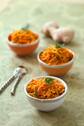 Carottes râpées cuites aux épices et à la moutarde
